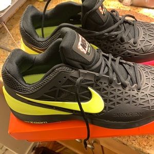 Nike. Size 14 mens. Black neon and pink soles. In Good Condition